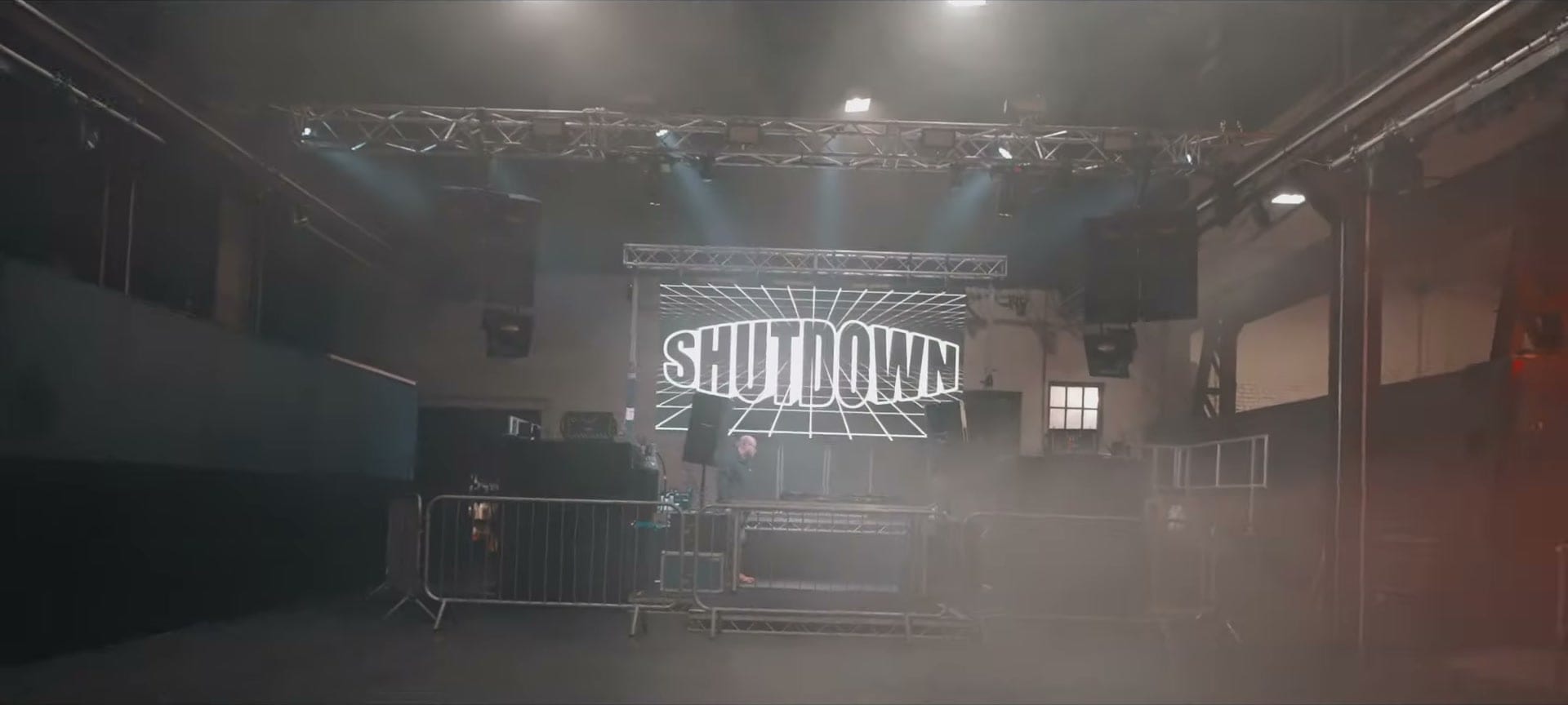 The SHUTDOWN stage lit up in haze inside Forge Warehouse, Sheffield, before the doors open